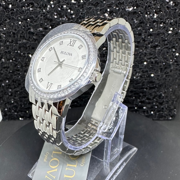 Women's (NWT) Silver Bulova with Mother-of-Pearl face, Diamond hours, & crystals - Picture 4 of 5